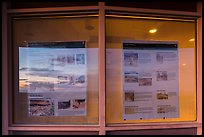 Sunset and attractions listings, Far View visitor center window reflexion. Mesa Verde National Park, Colorado, USA. (color)