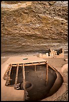 Reconstructed pithouse and original walls below rock roof, Step House. Mesa Verde National Park ( color)