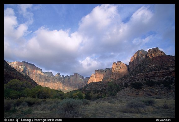 Wide view of Towers of the Virgin and clouds at sunrise. Zion National Park, Utah, USA.