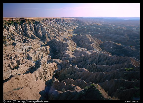 Basin of spires, pinacles, and deeply fluted gorges,  southern unit, early morning. Badlands National Park (color)