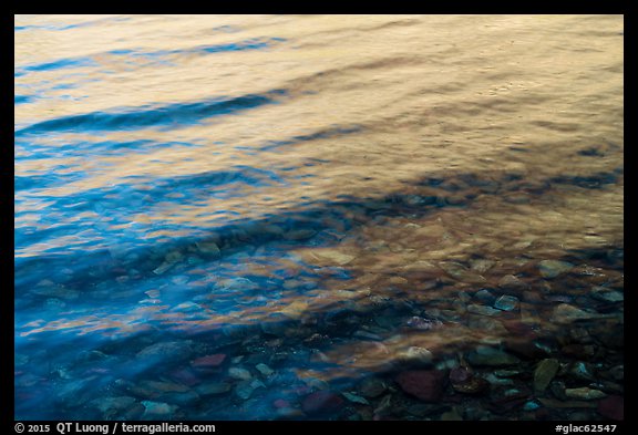 Reflection, ripples, and pebbles, Two Medicine Lake. Glacier National Park (color)