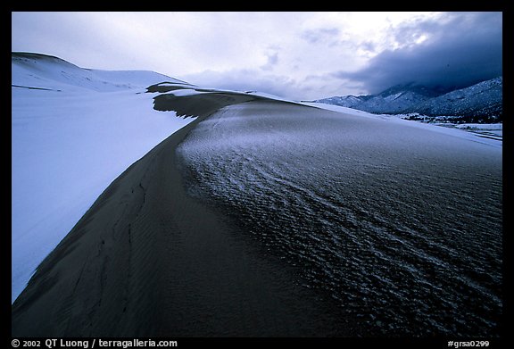 Snow on the dunes. Great Sand Dunes National Park, Colorado, USA.