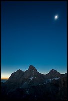 Tetons with eclipsed sun. Grand Teton National Park ( color)