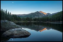 Bear Lake, Longs Peak, boulder and moon. Rocky Mountain National Park, Colorado, USA.