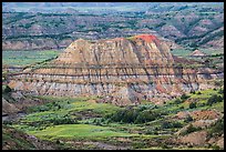 Butte with red scoria cap, Painted Canyon. Theodore Roosevelt National Park, North Dakota, USA. (color)