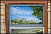 North Unit Visitor Center window reflexion. Theodore Roosevelt National Park, North Dakota, USA. (color)