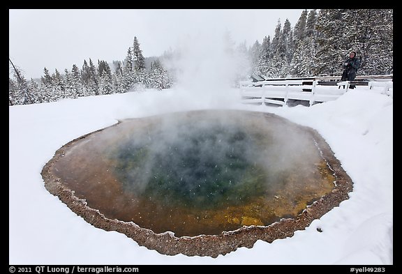 Hiker at Morning Glory Pool, winter. Yellowstone National Park (color)