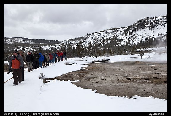 Large group of tourists in winter. Yellowstone National Park, Wyoming, USA.