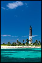 Loggerhead Light, palm trees and turquoise waters. Dry Tortugas National Park, Florida, USA.