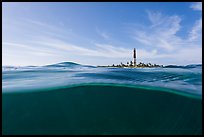 Split view of waters and Loggerhead Light. Dry Tortugas National Park, Florida, USA.