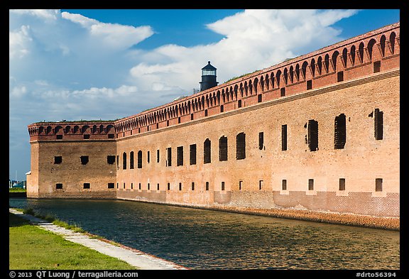 Moat, wall, and Harbor Light. Dry Tortugas National Park, Florida, USA.