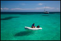 Dinghy and sailbaot in transparent waters, Loggerhead Key. Dry Tortugas National Park, Florida, USA. (color)