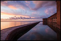 Fort Jefferson seawall, moat and walls at sunset. Dry Tortugas National Park, Florida, USA. (color)