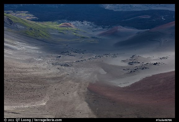 Red Cinder flow and green vegetated ridge in Haleakala Crater. Haleakala National Park, Hawaii, USA.