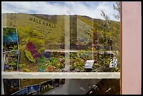 Haleakala slopes and native garden with signs, Park Headquarters Visitor Center window reflexion. Haleakala National Park ( color)