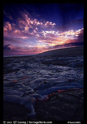 Live lava flow on coastal plain sunset. Hawaii Volcanoes National Park, Hawaii, USA.