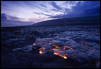 [open edition]   Molten lava flow at sunset near the end of Chain of Craters road. Hawaii Volcanoes National Park, Hawaii, USA.