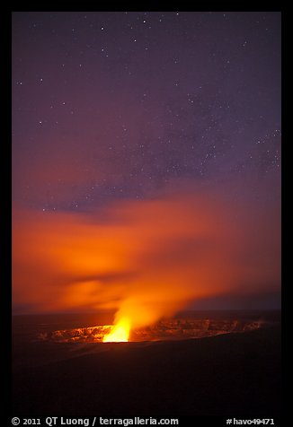 Glow from molten lava illuminates night sky, Kilauea volcano. Hawaii Volcanoes National Park (color)