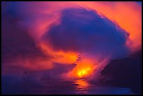 Lava steam swirls above ocean at dusk. Hawaii Volcanoes National Park, Hawaii, USA. (color)