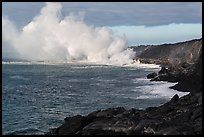 Clouds of smoke and steam produced by lava flowing into ocean. Hawaii Volcanoes National Park, Hawaii, USA. (color)