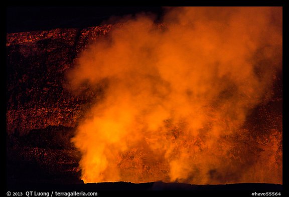 Halemaumau plume and crater walls lit by lava lake. Hawaii Volcanoes National Park, Hawaii, USA.