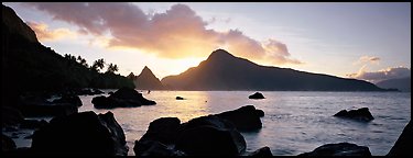 Coastline with boulders at sunrise, Ofu Island. National Park of American Samoa (Panoramic color)
