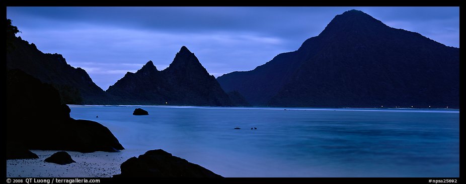 Bay with coastal peaks at dusk. National Park of American Samoa (color)