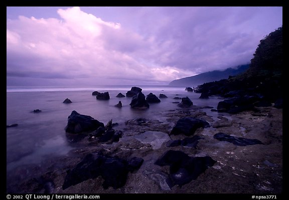 Boulders and coastline at sunrise, Siu Point, Tau Island. National Park of American Samoa (color)