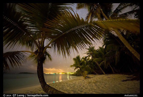 Salomon beach with distant lights at night. Virgin Islands National Park, US Virgin Islands.