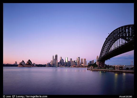Harbor Bridge, skyline, and Opera House, dawn. Australia (color)