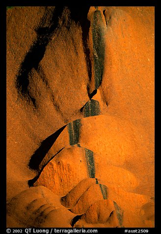 Rock sculptured by flash flood flows on Ayers Rock. Uluru-Kata Tjuta National Park, Northern Territories, Australia