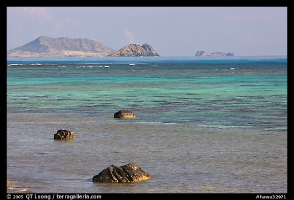Rocks and turquoise waters near Makai research pier. Oahu island, Hawaii, USA