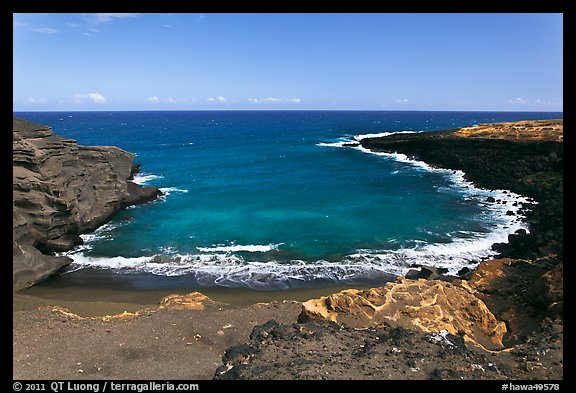 Collapsed cinder cone with green sand, South Point. Big Island, Hawaii, USA