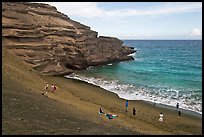 People on Mahana (green sand) Beach. Big Island, Hawaii, USA
