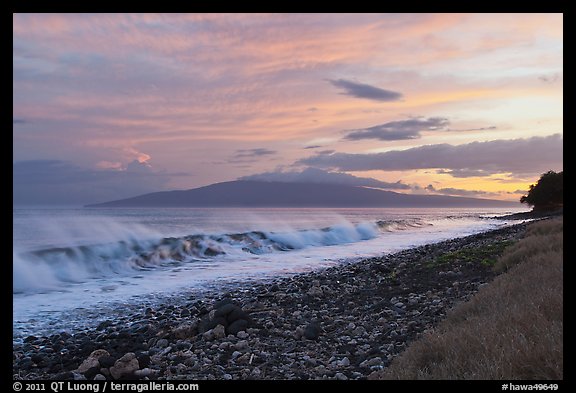 Lanai Island and crashing surf at sunset. Lahaina, Maui, Hawaii, USA
