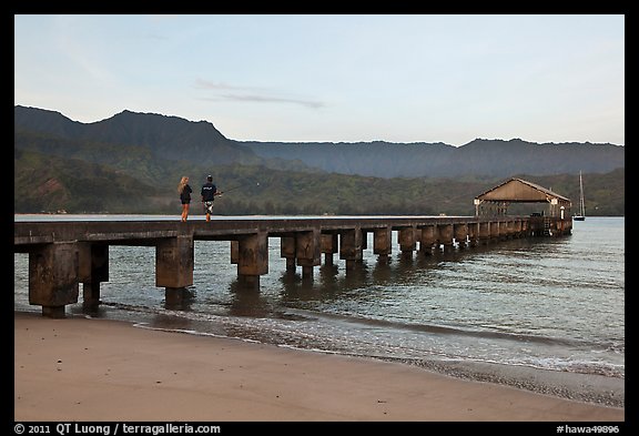 Conversation on Hanalei Pier. Kauai island, Hawaii, USA (color)