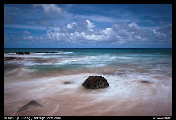 Volcanic rock and wave motion. Kauai island, Hawaii, USA (color)