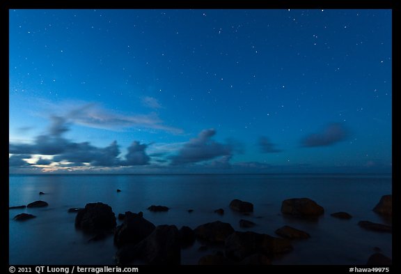 Rocks, ocean, and stars. Kauai island, Hawaii, USA (color)