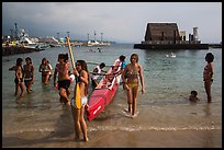 Girls and outrigger canoe, Kailua-Kona. Hawaii, USA (color)