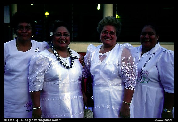 Sunday women churchgoers dressed in white, Pago Pago. Pago Pago, Tutuila, American Samoa (color)
