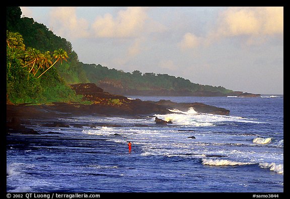 Fisherman on rocky coast near Vailoa. Tutuila, American Samoa (color)