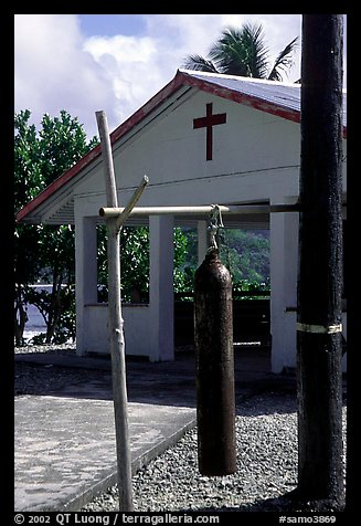 Gong and church, Aunuu village. Aunuu Island, American Samoa