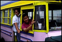 Women in a colorful bus. Pago Pago, Tutuila, American Samoa (color)