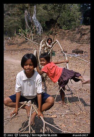 Kids playing, the Bayon. Angkor, Cambodia