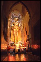 One of four monumental statues inside Ananda pahto. Bagan, Myanmar (color)