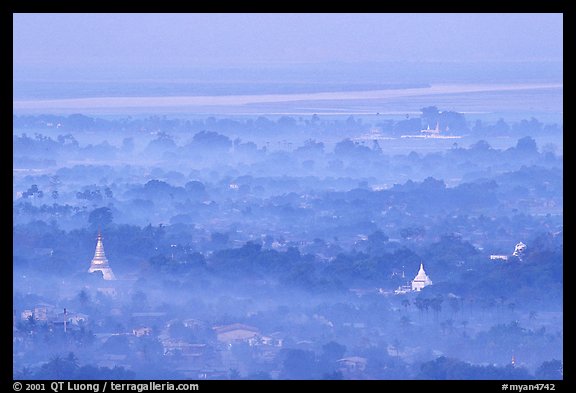 View from the hill through dawn mist. Mandalay, Myanmar