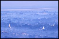 View from the hill through dawn mist. Mandalay, Myanmar
