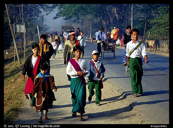 Walking on road near Swwenyaung. Shan state, Myanmar (color)