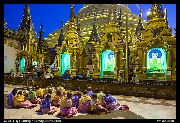 Nuns praying, Shwedagon Pagoda. Yangon, Myanmar (color)