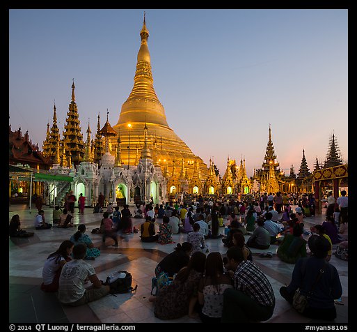Praying from the Victory Ground, Shwedagon Pagoda, sunset. Yangon, Myanmar (color)